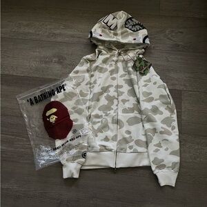 White on white bape camo hoodie
Size L